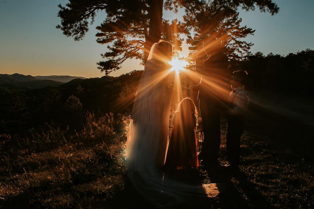 fix your marriage post featuring a man and woman getting married with their two children looking up at them 